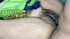 komol's maid sweeping and picking clothes on bed