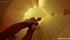 Brett Rossi intensely masturbates in the shower, showcasing her big tits and ass