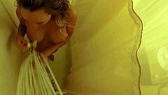 Brett Rossi intensely masturbates in the shower, showcasing her big tits and ass