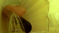 Brett Rossi intensely masturbates in the shower, showcasing her big tits and ass