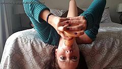 Petite teen gags on dildo in extreme upside-down deepthroat