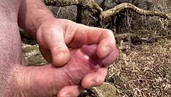 Naked woman cumming by the river with clothes ripped and cumshot