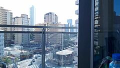 sexy redhead teen flashes her curves on balcony outdoors