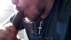 I'm performing a blowjob on a big black cock.