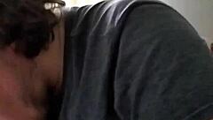 I'm performing a blowjob on a big black cock.