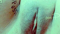 Closeup of amateur girlfriend's shaved pussy getting fingered and rubbed in homemade solo masturbation