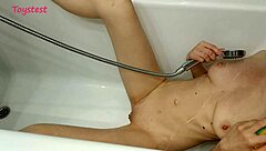 Young milf takes shower while boyfriend films her