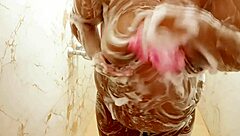 indian hyderabad aunty bathing in shower with big tits exposed.