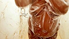 indian hyderabad aunty bathing in shower with big tits exposed.