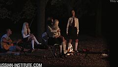 Blonde Gina Gerson engages in anal and blowjob threesome at the campfire