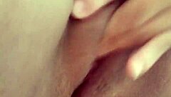 SHE MOANS LOUDLY WHILE MASTURBATING IN BED, ORGASM DRIPPING WET