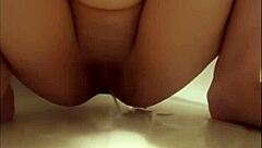 slender brunette pissing in panties during steamy shower compilation