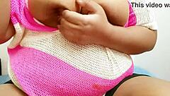 This sexy amateur babe has big tits and loves showing them off