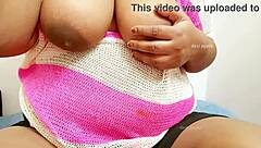 This sexy amateur babe has big tits and loves showing them off