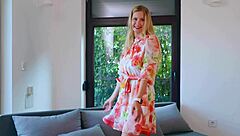 Blonde pornstar shows off her huge natural tits in dresses