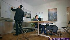 An office slut wears pantyhose and gives footjob to her colleague