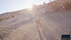 Blonde milf stripteases in desert