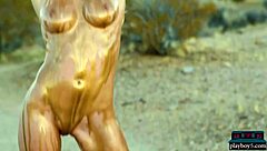 Old blonde bombshell undressing in the desert for you