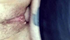Naked wife showing off long legs and hairy pussy