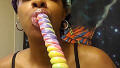 Ebony Babe Sucks Unicorn Lollipop In Fetish Detail