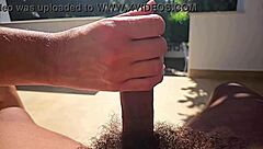 Housewife gives slow motion handjob outdoors!