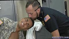 Police officers in uniform having gay sex in a threesome scene