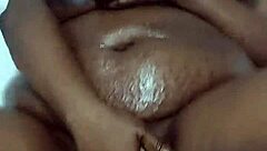 Ebony whore squirts during solo dildo masturbation