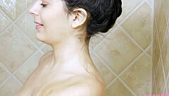 Brunette Beauty's Enchanting Shower Photoshoot on Sofa