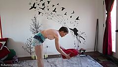 european brunette teaches yoga poses to friend