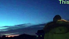 A camgirl fucks with a fan, licking shaved tits and pussy