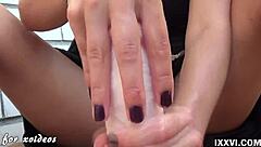 Hey, watch this teen babe give a footjob and handjob with a big dildo at home.