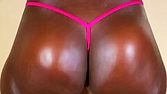 Ebony goddess strips and teases in lingerie.