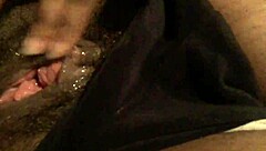 she explores her wet pussy alone, leading to intense squirting