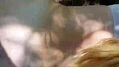 Cumshot on the tongue in a hot outdoor scene with a blonde in a ponytail