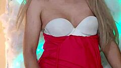 attractive transsexual in red crossdressing attire looks stunning.