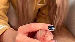 Amateur beauty Amélie Dubon gives a sensual handjob to her friend