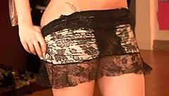 Watch sexy Ivy Black undress in a thrilling striptease.