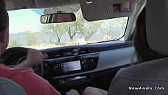 Couple Enjoying Outdoor Activities In Backyard With Friends