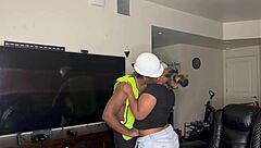 Construction worker kendale assists client on the job