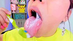 lila jordan brushes her teeth on webcam with tall tongue and huge saliva fetish spitting