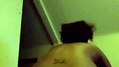 A couple engages in wet pussy riding with black cock.