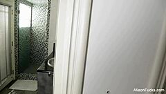 I feel so aroused masturbating in the shower with my big tits exposed