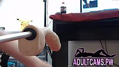 A tattooed girl likes to use a fucking machine while being licked by her partner