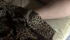 Wife explores her body with gentle fingers, feeling waves of pleasure and intimacy in their private moment.