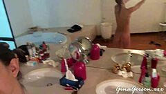 Teen blonde gives footjob in home video