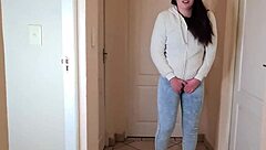 Teen pisses desperately in jeans and jacket