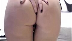 busty brunette milf masturbating on cam with big tits.