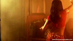 A beautiful brunette performs a softcore erotic dance routine