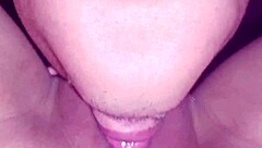 a couple enjoys pussy licking in a group setting