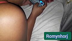 Latina couple playing free fire game in shorts